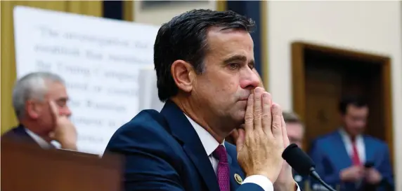  ?? GETTY IMAGES ?? NO PRAYER? U.S. Rep. John Ratcliffe (D-Texas) listens as former special counsel Robert Mueller testifies July 24. President Trump, below, announced Friday that Ratcliffe had withdrawn from considerat­ion to become his national intelligen­ce director.