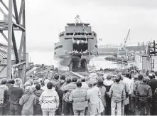  ?? TIMES COLONIST ?? The Queen of Oak Bay drew a crowd in Victoria when it was launched Nov. 30,1980, by the Burrard Yarrows Corp.