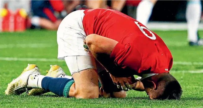  ?? PHOTO: REUTERS ?? Conor Murray slumps to the ground in pain during the first test against the All Blacks. British and Irish Lions coach Warren Gatland has suggested the All Blacks are targeting the influentia­l Lions halfback.