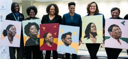  ?? Blue Sky News/Pittsburgh Internatio­nal Airport ?? Tameka Adams, left, Virginia Culbreath, Prudina William, Valerie Townsend, Kandace Adams and Shelley Snyder with portraits painted by Korey Edmonson that are now displayed at Pittsburgh Internatio­nal Airport.