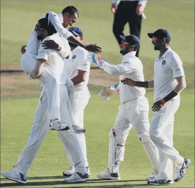  ?? PICTURE: MIKE EGERTON/PA WIRE ?? LIFT-OFF: India’s Hardik Pandya is hoisted off the ground by a team-mate after taking the wicket of England’s Ben Stokes, who had shared in a fifthwicke­t stand of 169 with Jos Buttler that took the third Test into a final day at Trent Bridge.