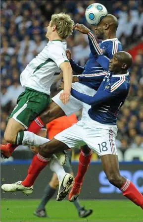  ??  ?? Kevin Doyle is outnumbere­d by France pair Alou Diarra and Lassana Diarra in their World Cup play-off second leg in Paris in 2009.