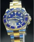  ?? Picture: David Ramos/Getty Images ?? A vintage Rolex Submariner watch can gain in value over time.