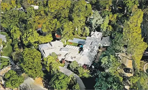  ?? Keller Williams Realty ?? “FULL HOUSE” actor John Stamos bought this Hidden Hills estate for $5.75 million. Set on 1.5 acres, the home is 5,750 square feet.