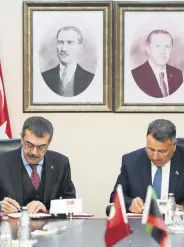  ?? ?? Yusuf Tekin (L) and Yahlif al-Sifav sign the MoU on education cooperatio­n, Ankara, Türkiye, Feb. 23, 2024.
