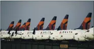  ?? ASSOCIATED PRESS ARCHIVES ?? Delta will resume its China route with flights two days a week from Seattle, but will switch to once-a-week flights to Shanghai from Seattle and Detroit in July.