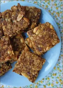  ?? AP ?? Coconut and peanut granola bars. MEERA SODHA