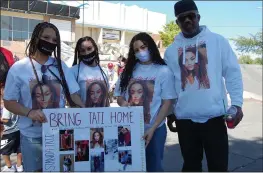  ?? PHOTOS BY SHARON MARTIN — ENTERPRISE-RECORD ?? From left to right: Jalissa Mosley, Kayla Wilson, Tyana Mosley and Charles Mosley wear shirts and masks calling to “bring Tatiana home” Saturday afternoon in Oroville.