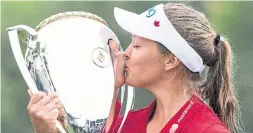  ?? JONATHAN HAYWARD THE CANADIAN PRESS ?? At 21, Brooke Henderson has won more tour titles (nine) than any other Canadian golfer. Last year she ended Canada’s 45-year drought on home soil.