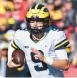  ?? BEN JACKSON/GETTY ?? Quarterbac­k J.J. McCarthy led Michigan over rival Ohio State on Saturday, securing the Wolverines’ trip to the Big Ten title game.