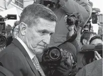  ?? REUTERS ?? Former U.S. national security adviser Michael Flynn passes by members of the media as he departs after his sentencing was delayed at U.S. District Court in Washington, U.S.