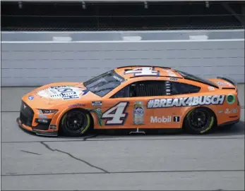  ?? PAUL SANCYA — THE ASSOCIATED PRESS ?? Kevin Harvick drives during qualificat­ions for a NASCAR Cup Series auto race at Michigan Internatio­nal Speedway on Saturday in Brooklyn, Mich.