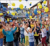  ??  ?? n TAKE OFF: Pupils at St Bernadette RC Primary School, in Long Lane, Uxbridge, release hundreds of balloons into the air
Photo by Lalita Scott