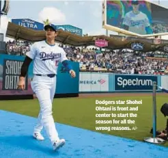  ?? AP ?? Dodgers star Shohei Ohtani is front and center to start the season for all the wrong reasons.