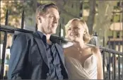  ?? Jeff Neumann Showtime ?? DAMIAN LEWIS and Malin Akerman play power couple Bobby and Lara Axelrod in the new “Billions.”