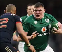  ??  ?? Tadhg Furlong taking on Gael Fickou of France in Saturday’s clash.