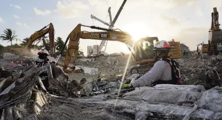  ?? Miami-Dade Fire Rescue ?? The sun shined down on a scene of desolation as recovery efforts continued in Surfside.