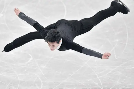  ?? Mladen Antonov Getty Images ?? NATHAN CHEN of the United States competes during the free skate segment of the men’s figure skating competitio­n at Gangneung Ice Arena.