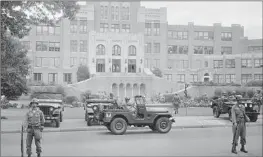  ?? Associated Press ?? CENTRAL HIGH in Little Rock, Ark., the site of 1957’s historic desegregat­ion crisis, is now the source of a lawsuit over an AP African American studies class.