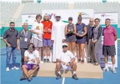  ?? ?? ↑
Danial Rakhmatull­ayev and other winners pose for a picture with the officials during the presentati­on ceremony.