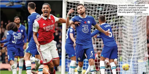  ?? JOHN WALTON/PA ?? Arsenal’s William Saliba and Chelsea’s Jorginho (right) react after Arsenal’s Gabriel scores the only goal of the game
