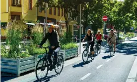  ?? ?? Wide roads in Berlin make cycling popular and relatively safe. Photograph: Frank Heinz/ Alamy