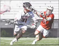  ?? Dave Stewart / Hearst Connecticu­t Media ?? New Canaan’s Ryan Caione (31) drives past Greenwich’s Jason Tautel (19) on Saturday.