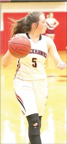  ??  ?? Senior Lady Blackhawk Avery Dayberry worked her way down the court Tuesday in the game against the Gentry Lady Pioneers.