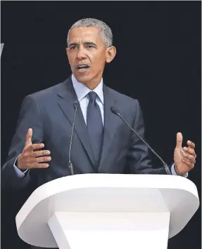  ??  ?? Ex-President Barack Obama speaks Tuesday in South Africa. THEMBA HADEBE/AP