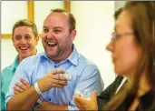  ?? Austin Dave/ The Signal ?? (Above) John Musella, immediate past chairman and acting executive director of the SCV Chamber, enjoys a laugh at the mixer. (Below) Neil Fitzgerald, national chapter developmen­t director of JCI USA, speaks with attendees.