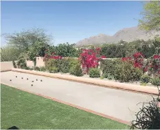  ?? JOHN VYBORNY/THE ASSOCIATED PRESS ?? A freshly completed bocce ball court at John Vyborny’s home in Tuscon, Ariz., was built by a contractor.