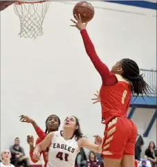  ?? Matt Freed/Post-Gazette ?? Penn Hills' Adia Brisker lays the ball up at the buzzer to defeat Oakland Catholic Jan. 10.