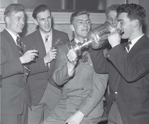  ??  ?? 0 Hearts’ 1956 heroes take a drink from the Scottish Cup following the 3-1 win over Celtic in the final at Hampden. From left, Willie Bauld, Jimmy Wardhaugh, Freddie Glidden, Alex Young and Ian Crawford. Inset, left, John Cumming who overcame a head gash to play on.