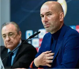  ??  ?? Huge shock: Real Madrid coach Zinedine Zidane (right) speaking at a press conference to announce his resignatio­n in Madrid yesterday. — AFP