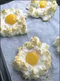  ?? Gretchen McKay/Post-Gazette ?? Cloud eggs are fluffy white meringues with an egg yolk nestled in the middle.