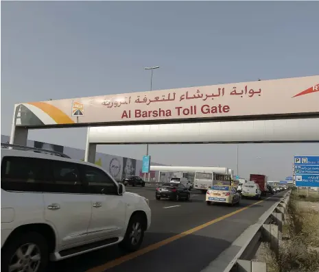  ?? Jeffrey E Biteng / The National ?? Al Barsha Toll Gate on Sheikh Zayed Road. The Salik electronic toll system was introduced in 2007