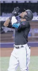  ?? MARTA LAVANDIER/AP ?? The Marlins’ Starling Marte looks up after his three-run home run during the eighth inning Friday in Miami.