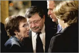  ?? Pablo Martinez Monsivais FROM GRIEF TO ACTIVISM Associated Press ?? Ruth Pearl, left, and her husband, Judea Pearl, talk to President George W. Bush at a Hanukkah reception in the Grand Foyer of the White House in 2007.