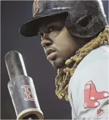  ?? AP PhoTo ?? SOMETHING’S MISSING: Hanley Ramirez has had a tough time adjusting to being a full-time designated hitter, and not having David Ortiz in the Red Sox lineup.