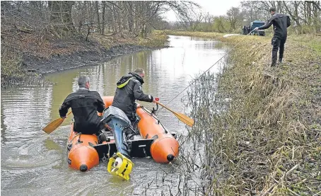  ?? Picture: Getty. ?? Police Scotland divers search a canal in Coatbridge for the remains of schoolgirl Moira Anderson.