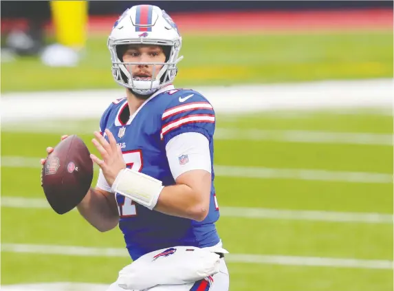  ?? PHOTOS: TIMOTHY T LUDWIG/GETTY IMAGES ?? Josh Allen, who threw for 4,544 yards and 37 TDs and ran for 421 yards and eight more majors, was twice named the AFC's player of the month.