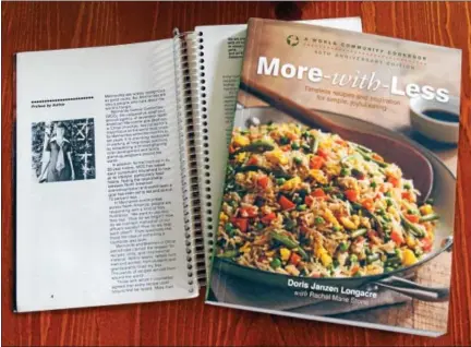  ?? PHOTO BY EMILY RYAN ?? The new edition of “More-with-Less” is larger and full of color photos.