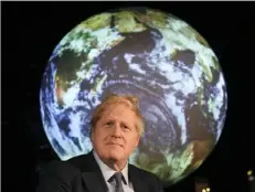  ?? Jeremy Selwyn/Associated Press ?? Britain’s Prime Minister Boris Johnson launches the U.K.hosted COP26 U.N. Climate Summit on Feb. 4 in London. World leaders breathed a sigh of relief when President Joe Biden vowed to work with Western allies.