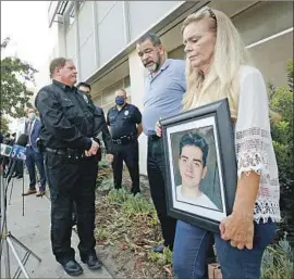  ?? Al Seib Los Angeles Times ?? THE PARENTS of Michael Kelly, 18, killed in 2019 in Pacoima, held a news conference seeking public help in homicides involving possible gang members.