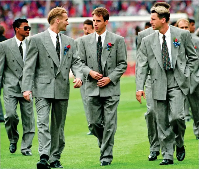  ?? NEIL EVERITT ?? Size matters: It’s 1990 and Southgate (centre), Thomas (left) and Alan Pardew maintain the tradition of looking awkward in an ill-fitting Cup final suit