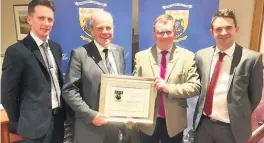  ??  ?? Deserved
Charles is presented with honorary membership of Blairgowri­e GC