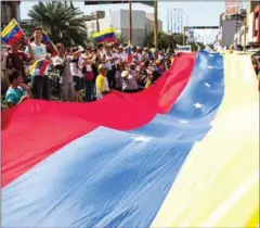  ?? STRINGER/AFP ?? People protest against leftist President Nicolas Maduro’s handling of a devastatin­g economic crisis, in Porlamar, Margarita Island on October 26.