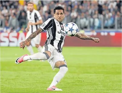  ?? Picture: AP. ?? Dani Alves volleys home from 25 yards to seal Juve’s place in the Champions League final.