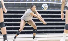  ??  ?? “I LOVE the support my teammates gave me,” outside hitter Karla Santos said. “I cried at practice, and every time they would tell me everything would be OK.”