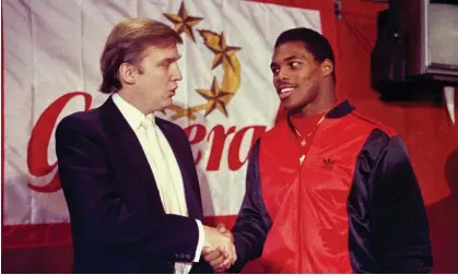  ?? Photograph: Dave Pickoff/AP ?? Donald Trump meets Herschel Walker in New York in 1984.